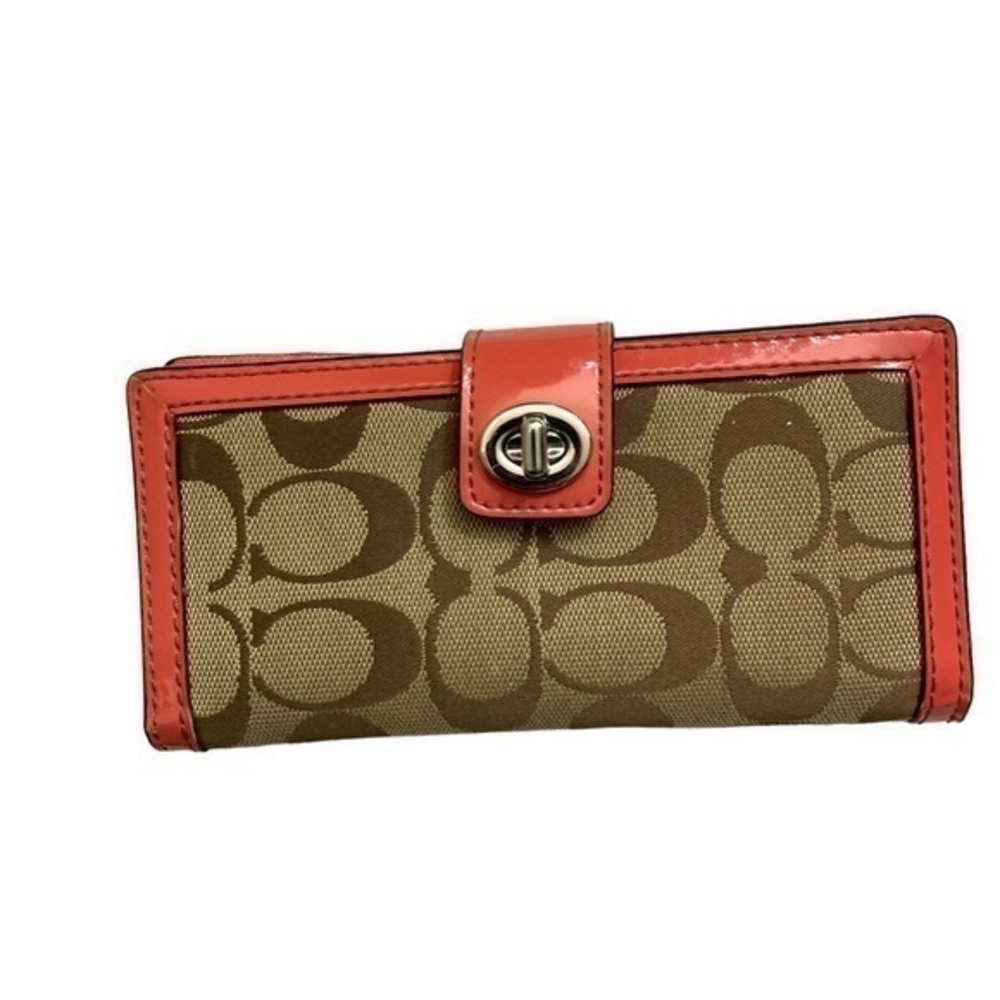 Coach brown khaki wallet with coral pink trim